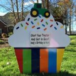 Rainbow cupcake with tractor topper